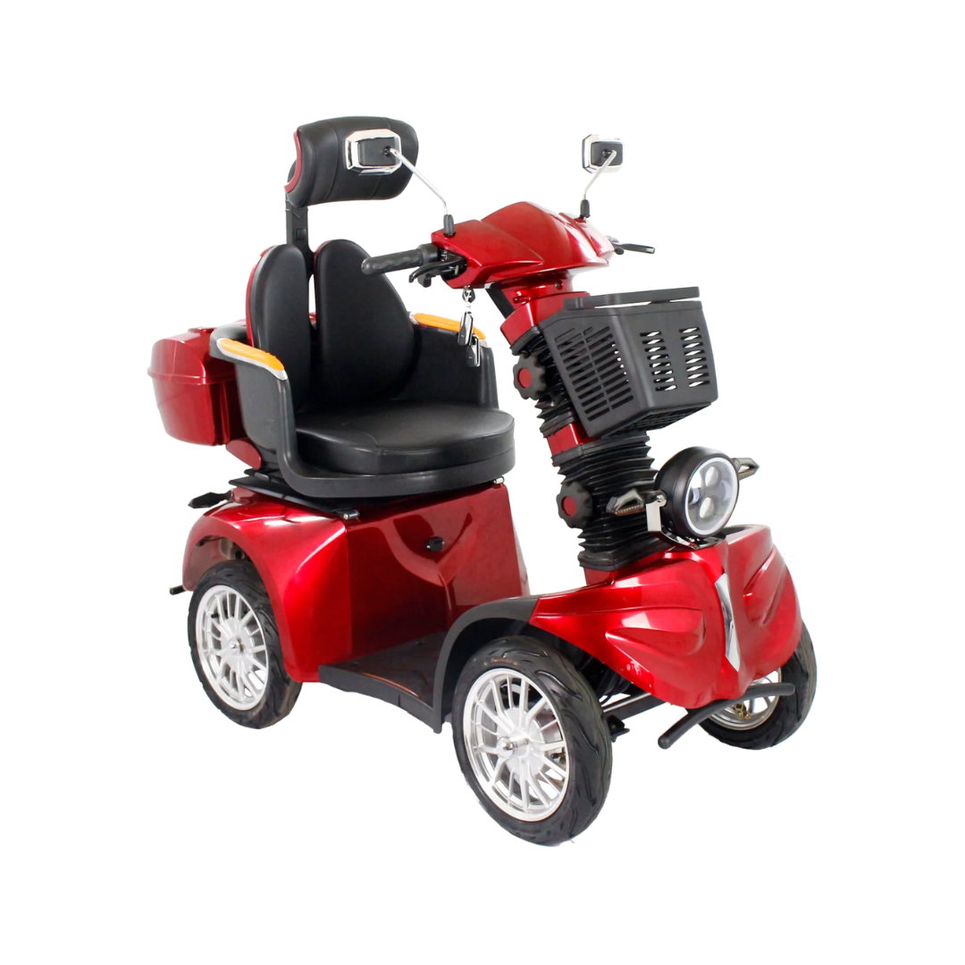 The GIO Tron Pro is a shiny red mobility scooter featuring 4-wheel stability, a padded seat with armrests and headrest, handlebars with mirrors, rear storage compartment, and a front headlight.
